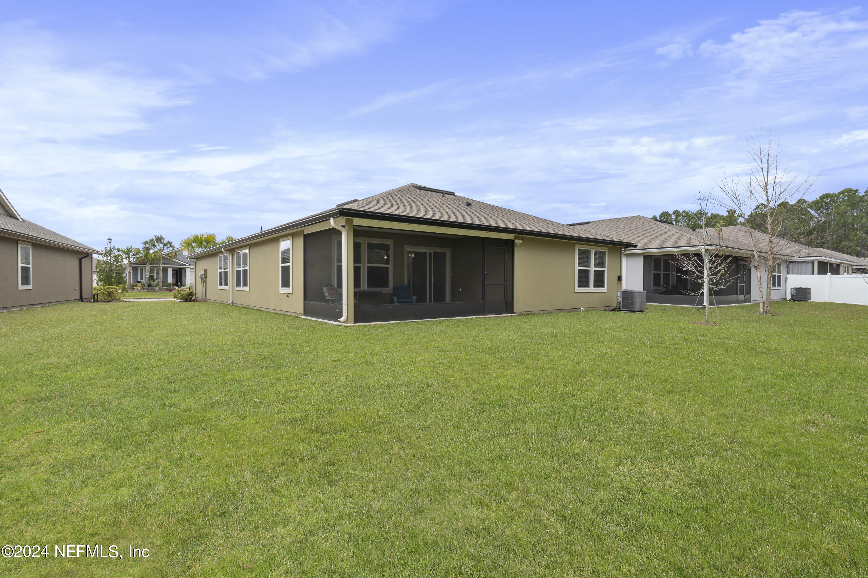 548 Palace Drive St. Augustine, FL 32084 - Photo 16 of 19 a view of a house with a backyard