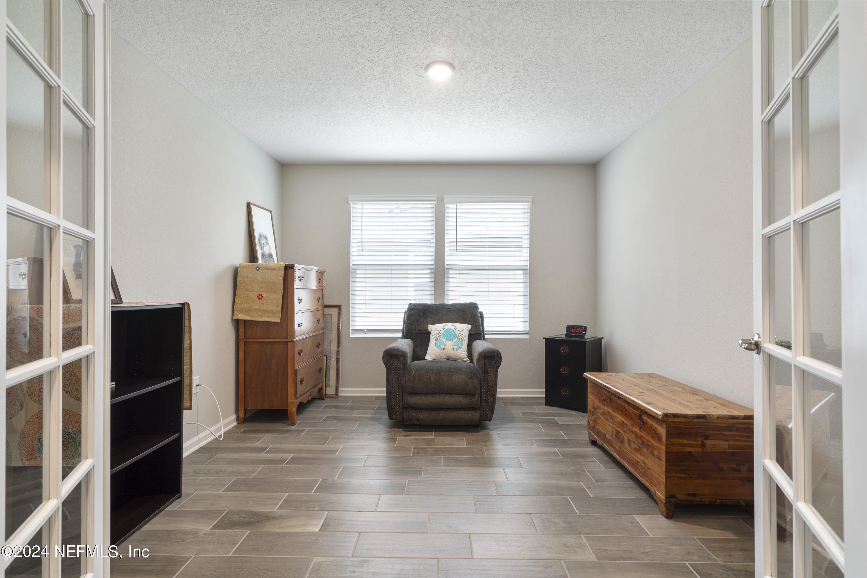 548 Palace Drive St. Augustine, FL 32084 - Photo 4 of 19 a living room with furniture and a window