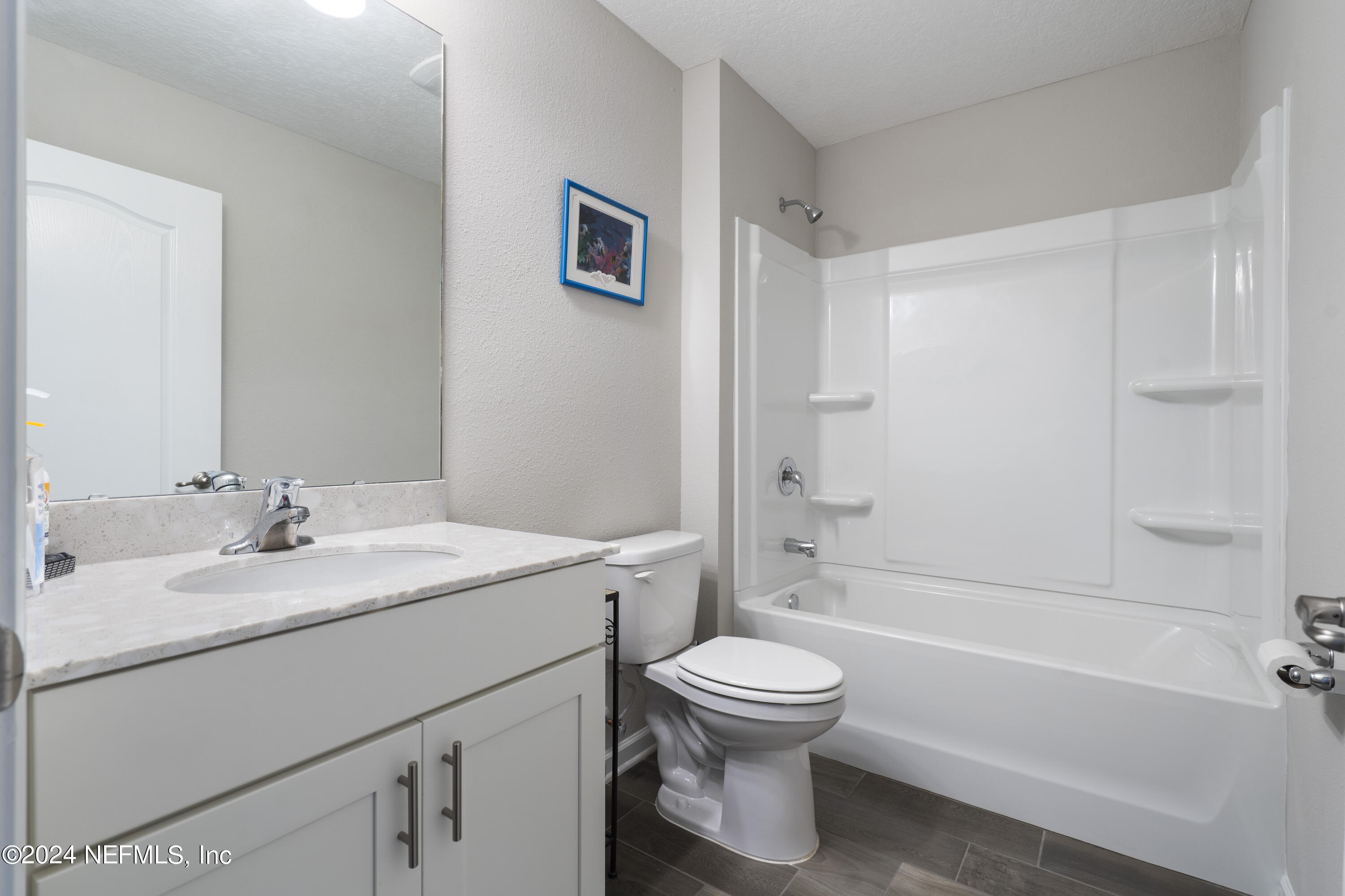 548 Palace Drive St. Augustine, FL 32084 - Photo 9 of 19 a bathroom with a sink toilet and shower