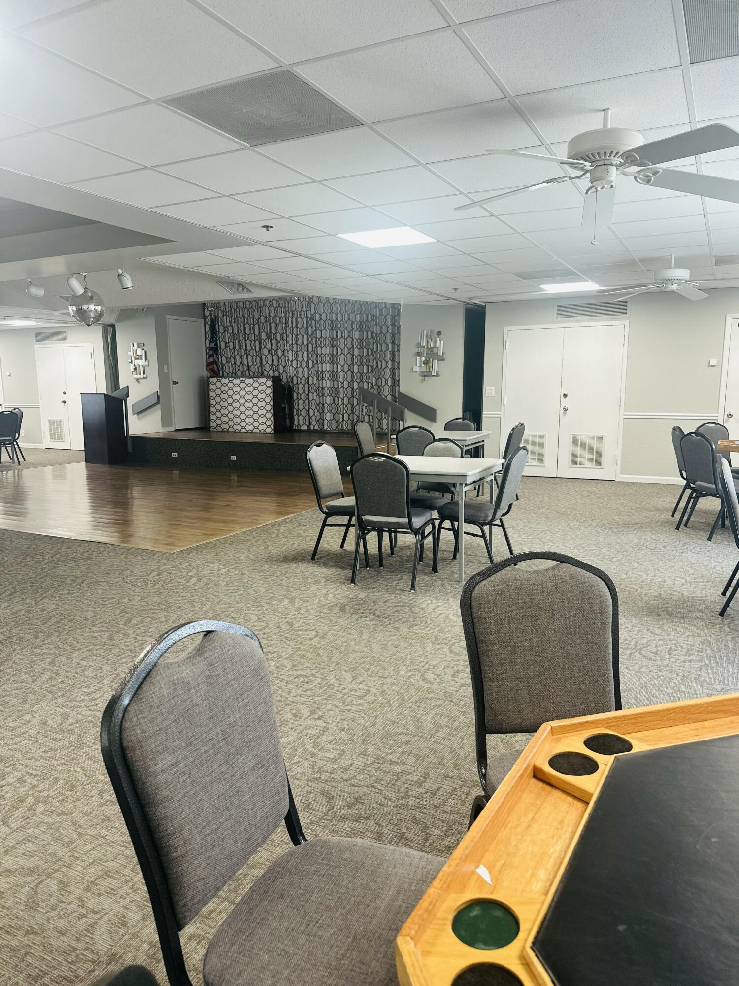 18900 Stewart Circle, Unit 7 Boca Raton, FL 33496 - Photo 21 of 23 a dining room with furniture and wooden floor