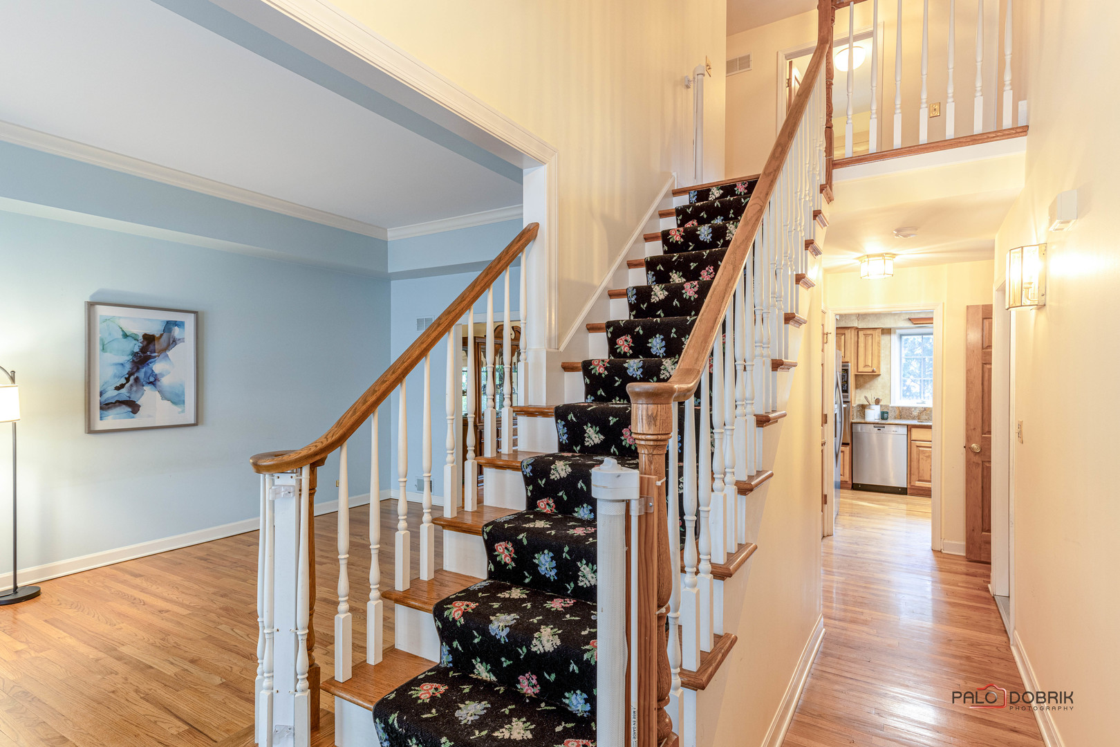 757 Hibbard Road Wilmette, IL 60091 - Photo 3 of 28 a view of a hallway with wooden floor and staircase