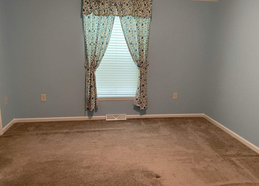 15 2nd Street Merrimac, MA 01860 - Photo 15 of 31 a view of an empty room with a window