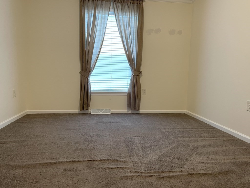 15 2nd Street Merrimac, MA 01860 - Photo 18 of 31 a view of a small space with wooden floor and a window