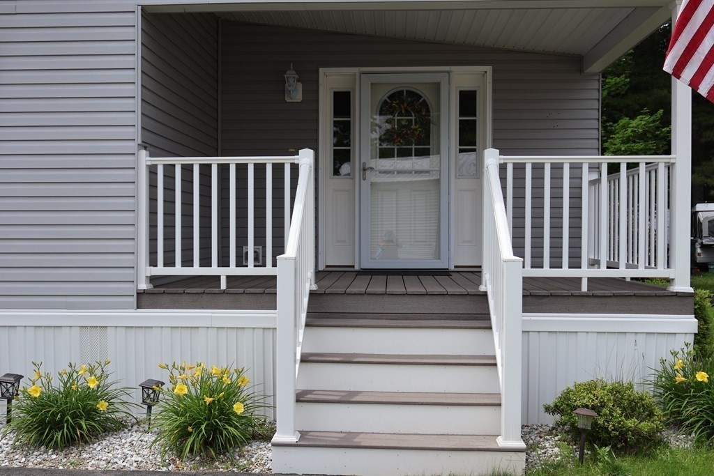 15 2nd Street Merrimac, MA 01860 - Photo 24 of 31 a view of a house with a small deck