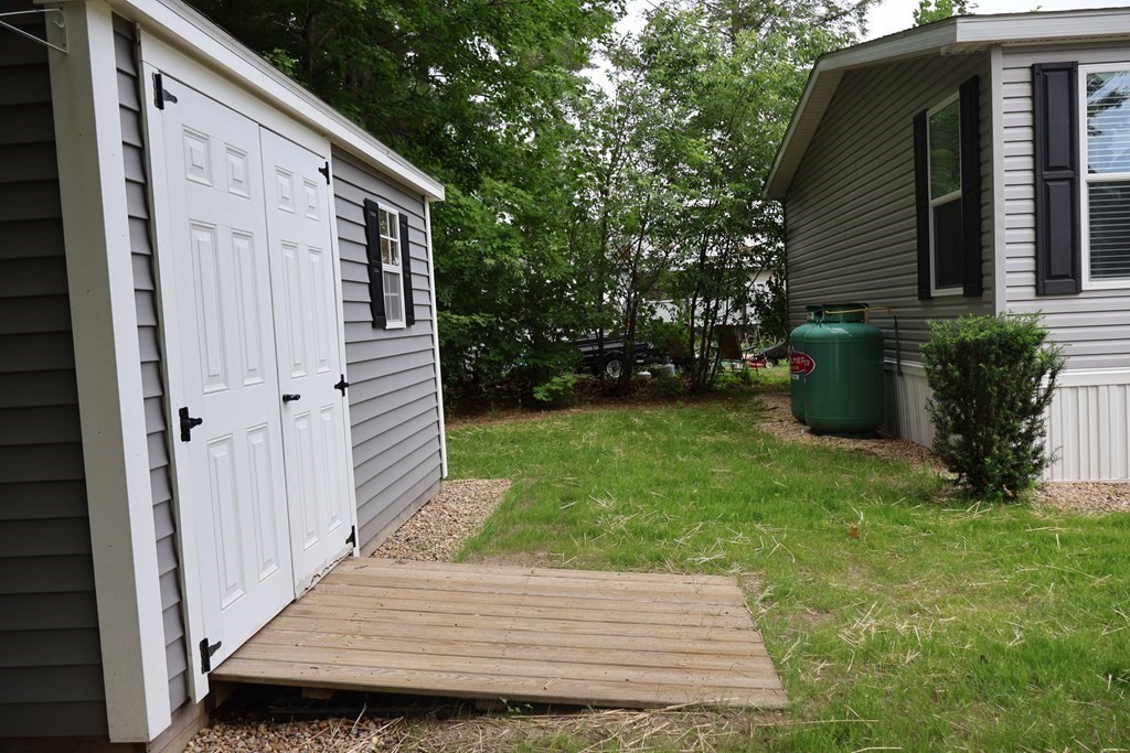 15 2nd Street Merrimac, MA 01860 - Photo 29 of 31 a view of a backyard with potted plants