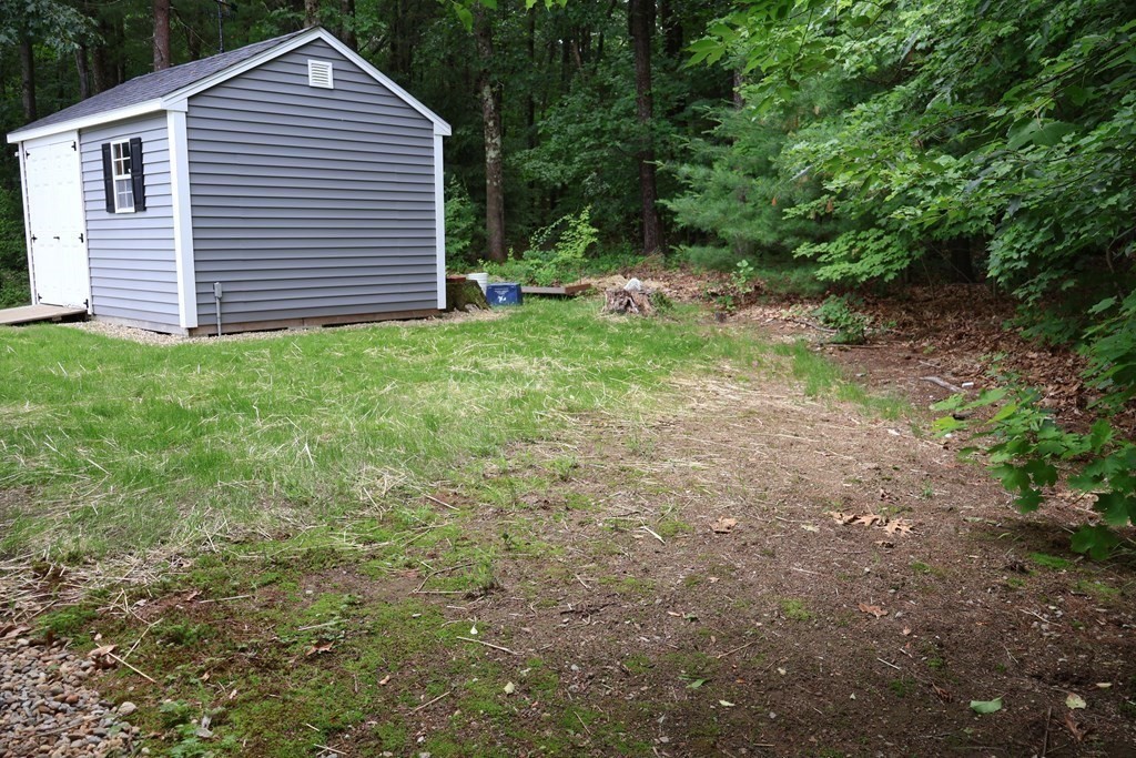 15 2nd Street Merrimac, MA 01860 - Photo 31 of 31 a view of backyard with a barbeque grill and stairs