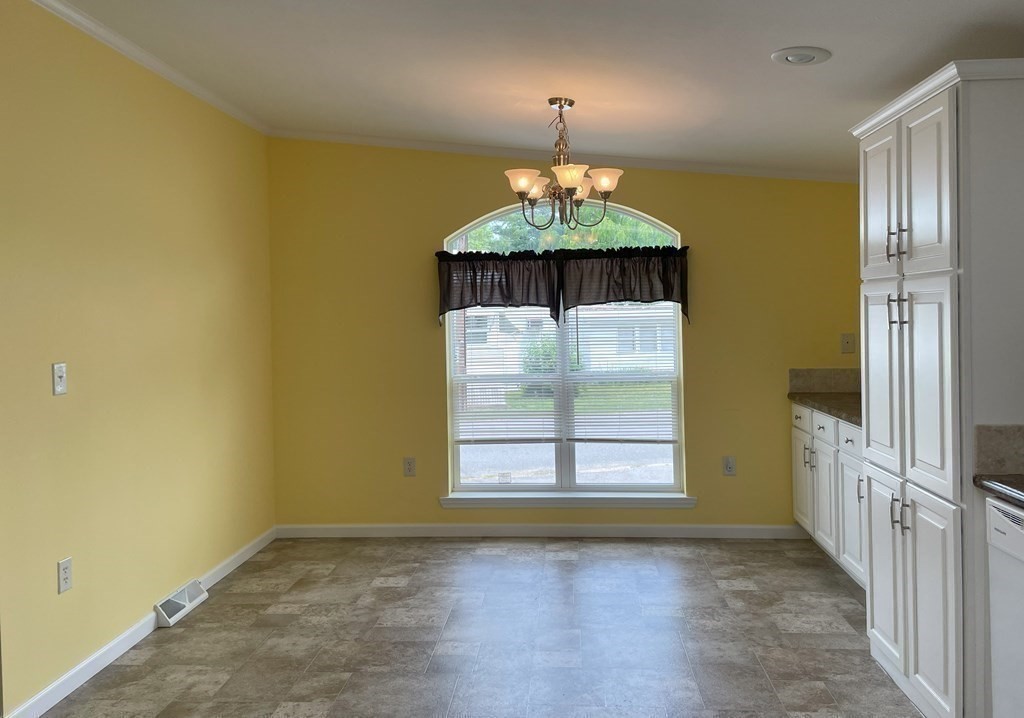15 2nd Street Merrimac, MA 01860 - Photo 7 of 31 an empty room with a windows
