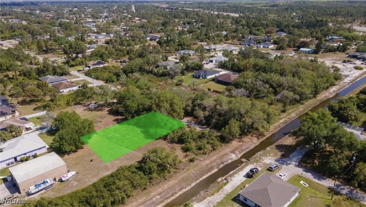 3816 37th Street Southwest Lehigh Acres, FL 33976 - Photo 3 of 5 an aerial view of residential house with outdoor space