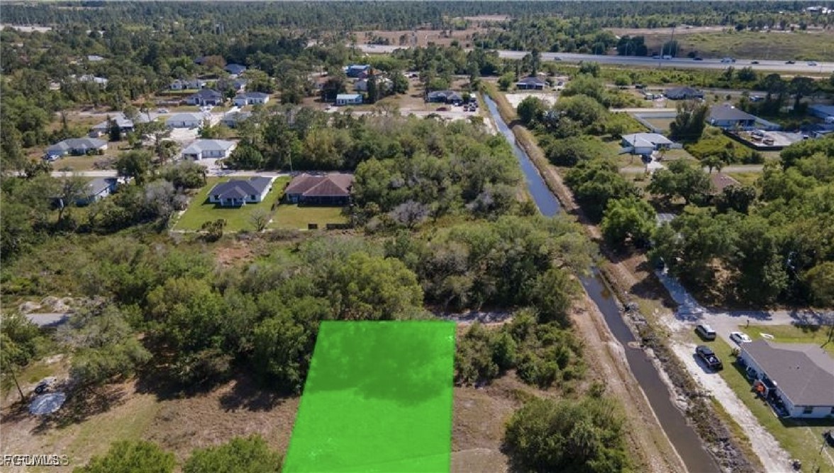 3816 37th Street Southwest Lehigh Acres, FL 33976 - Photo 4 of 5 an aerial view of multiple house