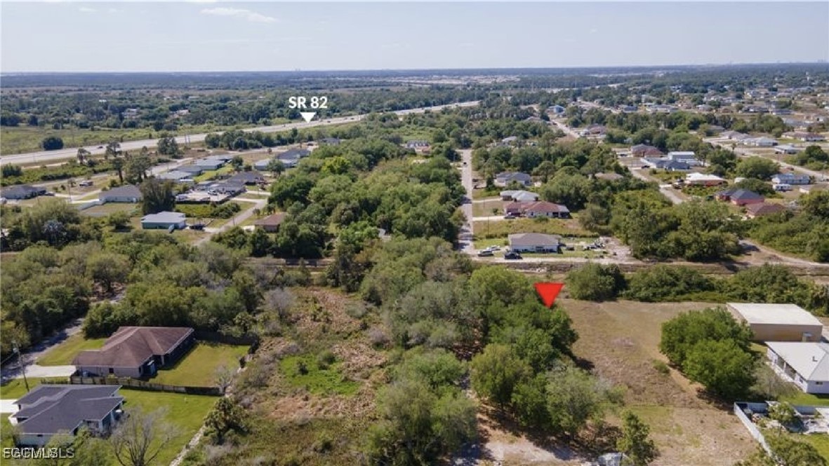 3816 37th Street Southwest Lehigh Acres, FL 33976 - Photo 5 of 5 an aerial view of multiple house