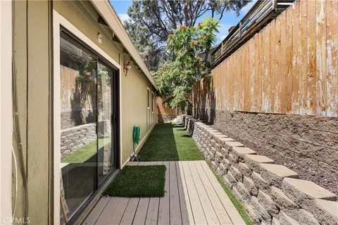 a view of a backyard of a house