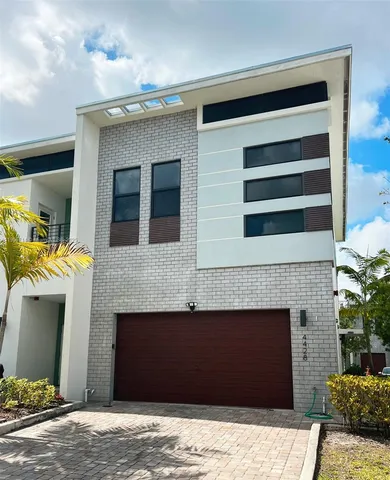 a front view of a house with a balcony