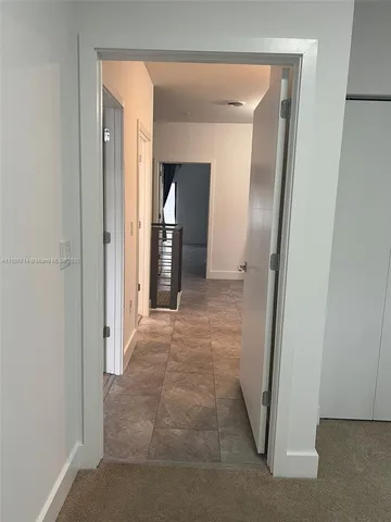 a bathroom with a sink double vanity and a mirror