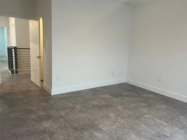a bathroom with a double vanity sink toilet and shower