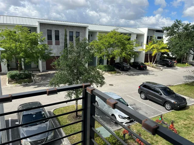 a kitchen with a table and chairs in it