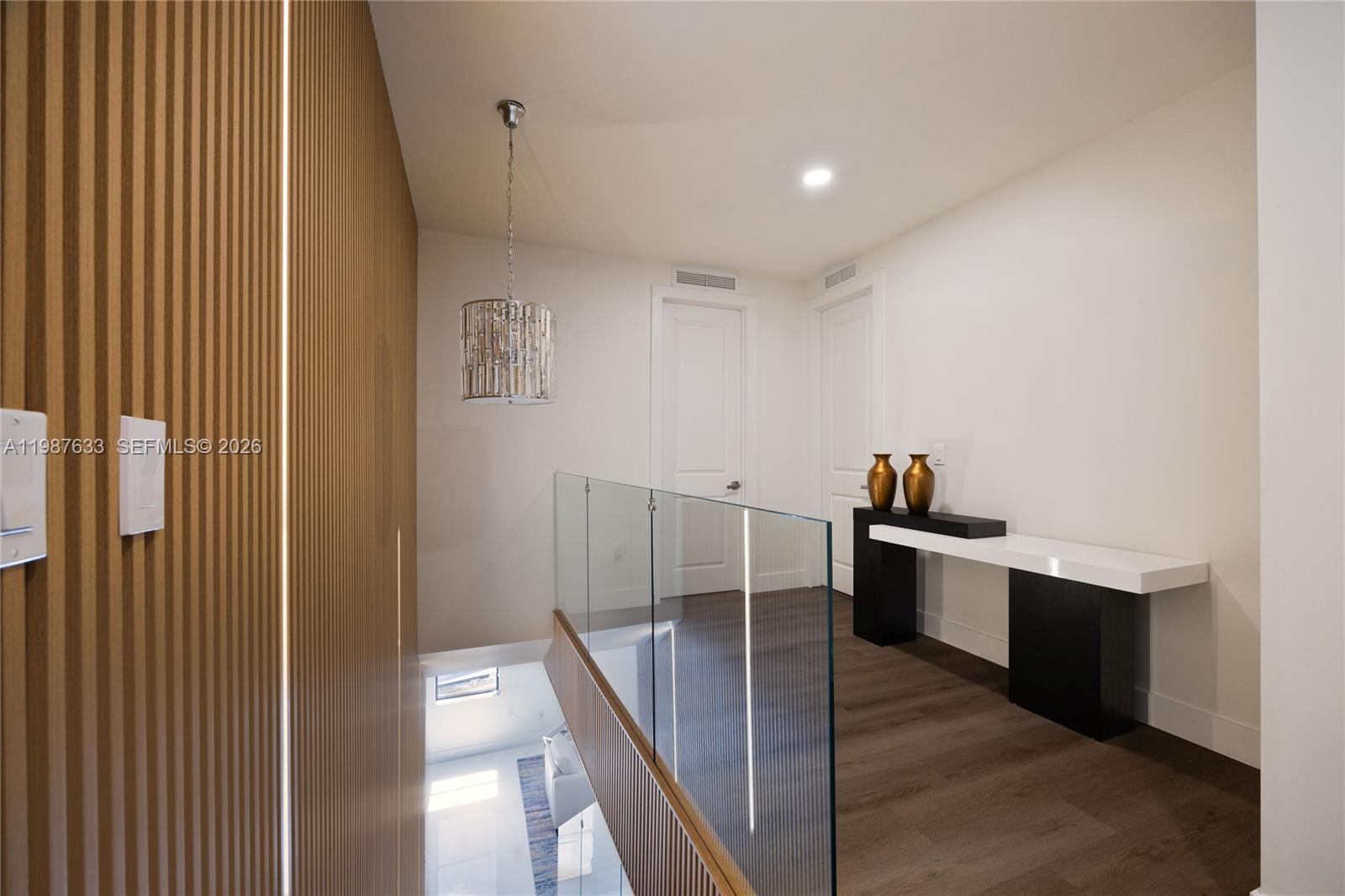 2981 Southwest 149th Avenue Miami, FL 33185 - Photo 16 of 30 a view of entryway and hall with wooden floor