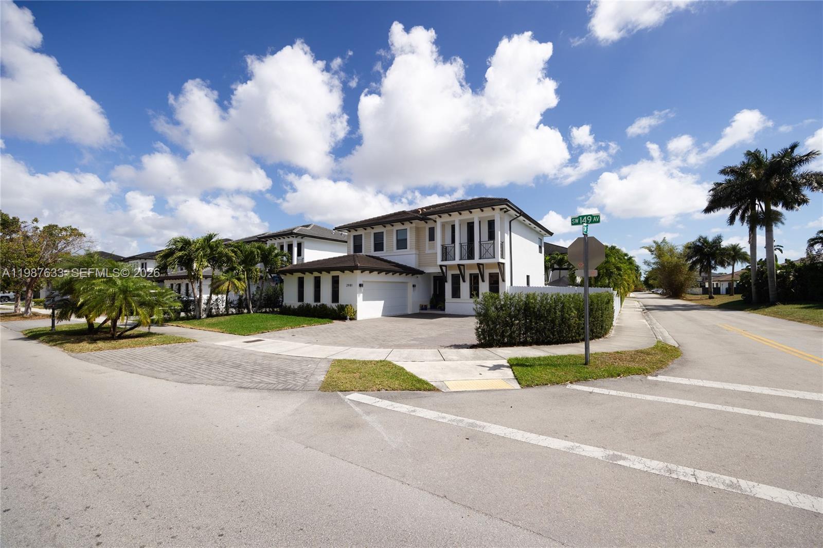 2981 Southwest 149th Avenue Miami, FL 33185 - Photo 2 of 30 a view of multiple houses with a street