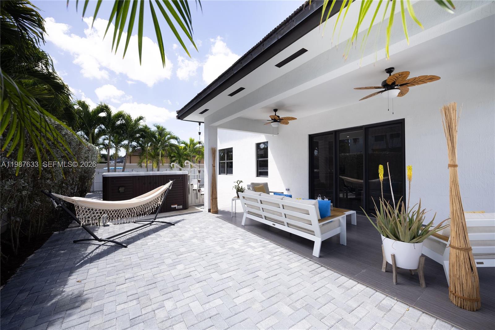 2981 Southwest 149th Avenue Miami, FL 33185 - Photo 28 of 30 a roof deck with a table and chairs