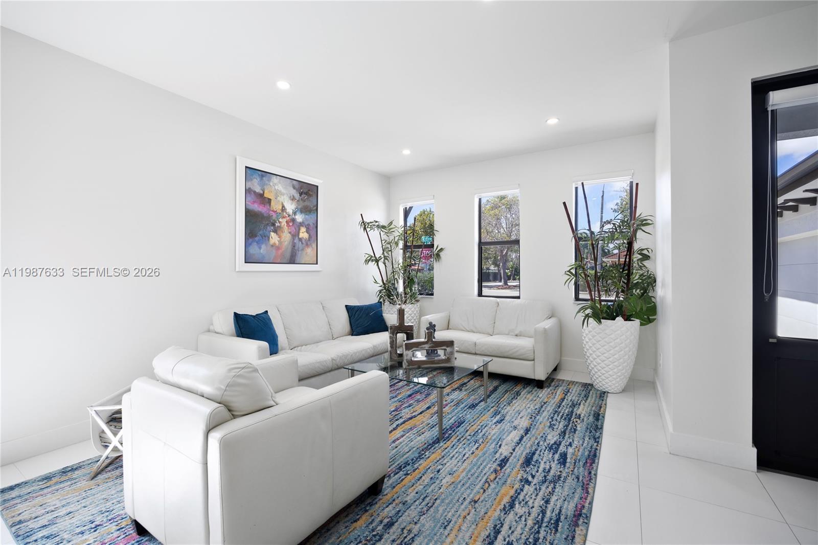 2981 Southwest 149th Avenue Miami, FL 33185 - Photo 6 of 30 a living room with furniture and wooden floor