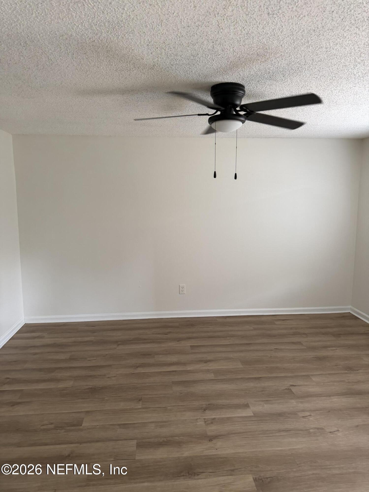 7539 Walden Road Jacksonville, FL 32244 - Photo 6 of 18 a view of a room with wooden floor