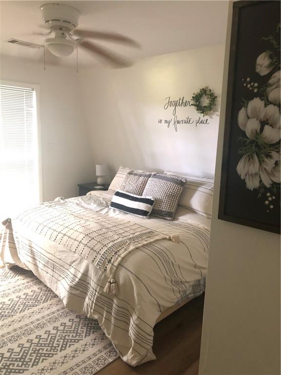 1492 Ivy Mountain Road Clarkesville, GA 30523 - Photo 20 of 53 a bedroom with a bed and cabinets