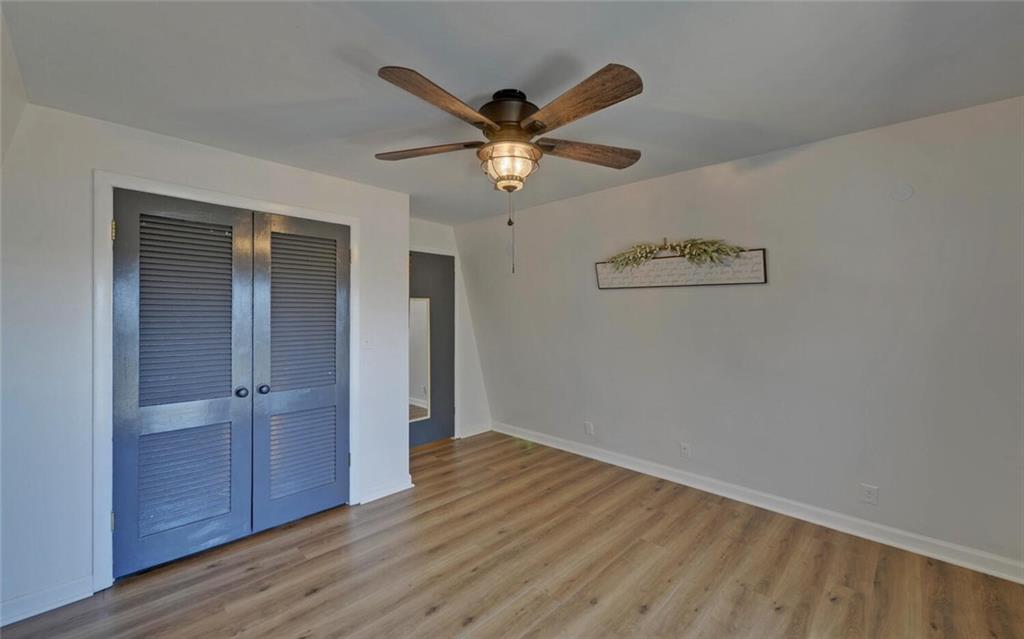 1492 Ivy Mountain Road Clarkesville, GA 30523 - Photo 23 of 53 a view of a hallway with wooden floor
