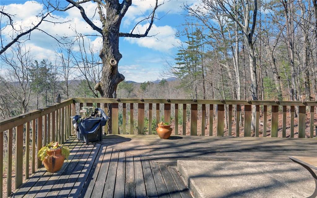 1492 Ivy Mountain Road Clarkesville, GA 30523 - Photo 34 of 53 a view of balcony with wooden floor and fence