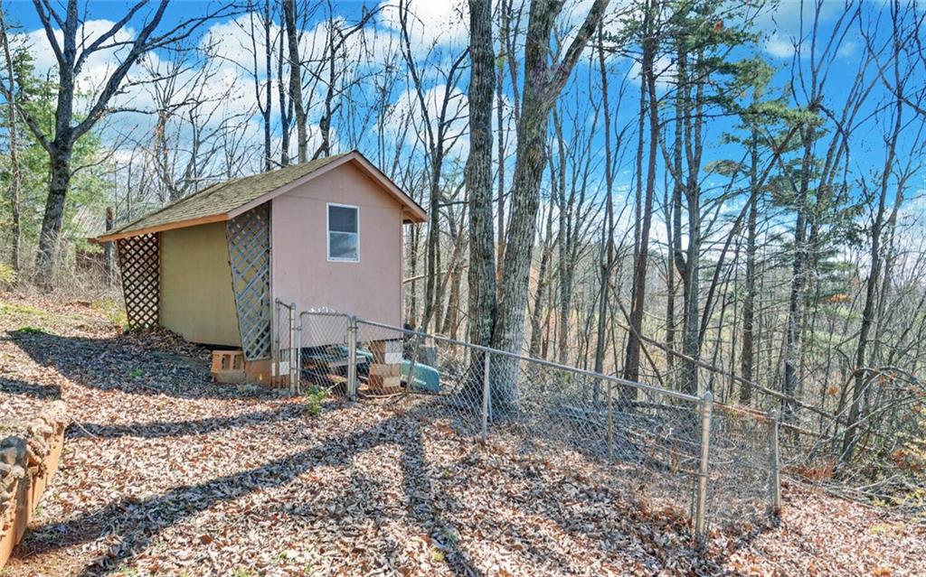 1492 Ivy Mountain Road Clarkesville, GA 30523 - Photo 39 of 53 a small barn in middle of the forest