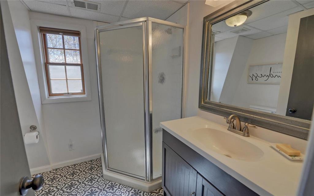 1492 Ivy Mountain Road Clarkesville, GA 30523 - Photo 4 of 53 a bathroom with a sink a vanity and a mirror