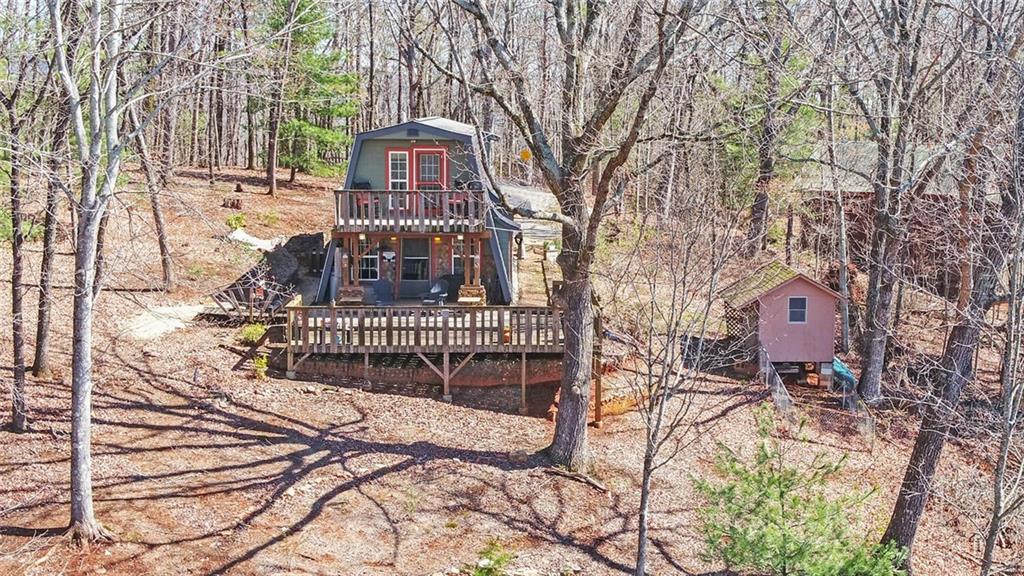 1492 Ivy Mountain Road Clarkesville, GA 30523 - Photo 42 of 53 a view of a house with a yard covered in snow