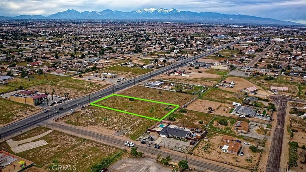 15058 Main Street Hesperia, CA 92345 - Photo 10 of 13 an aerial view of a city