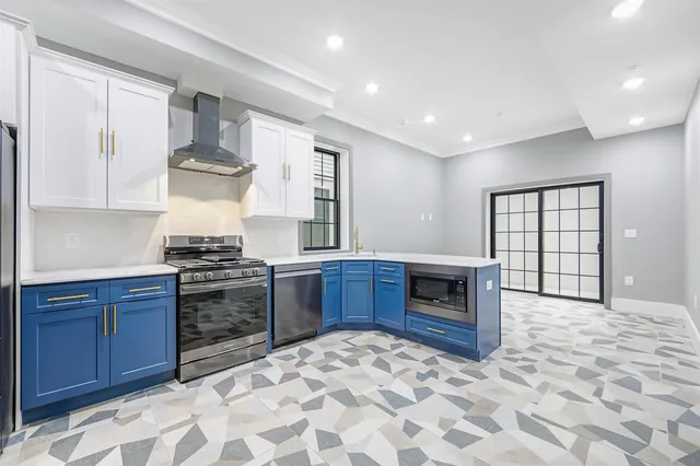 a large bathroom with a sink and a mirror