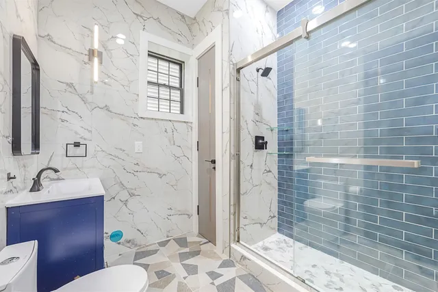 a view of a hallway with washer and dryer