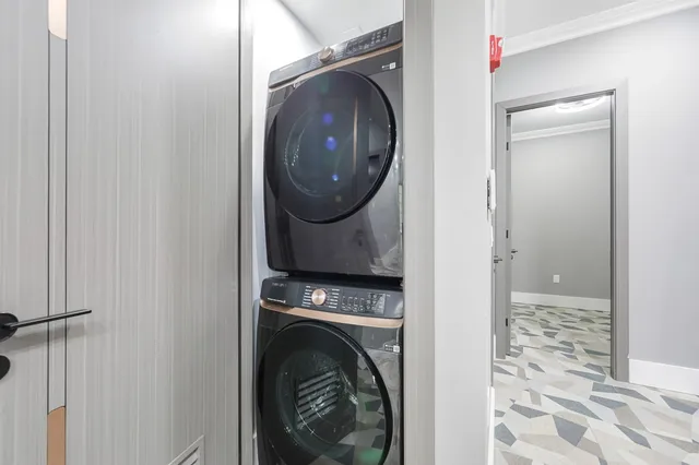 a view of a front door and wooden floor