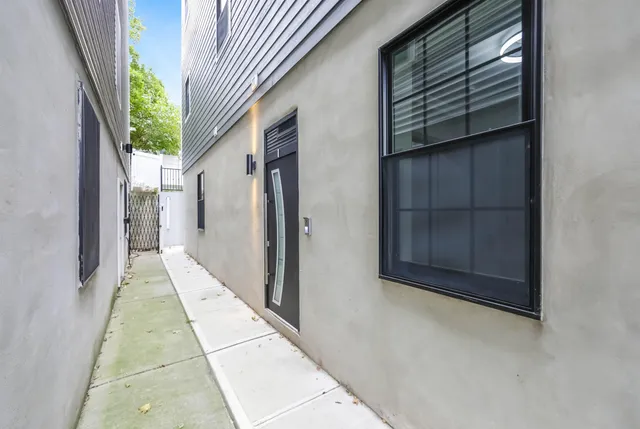 a view of a house with a door and stairs
