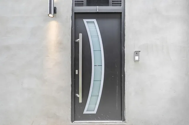 a view of a bathroom from a corridor
