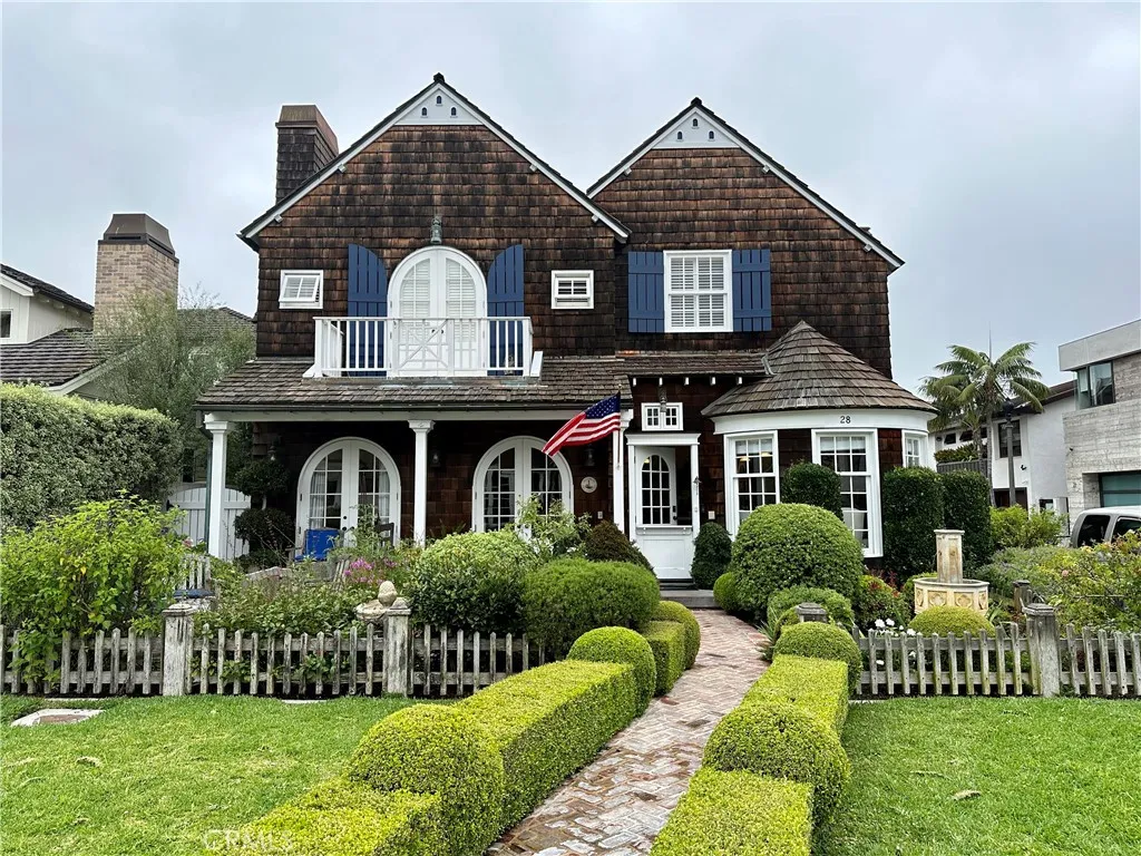 28 Beacon Bay Newport Beach, CA 92660 - Photo 14 of 15 a view of a house with a yard