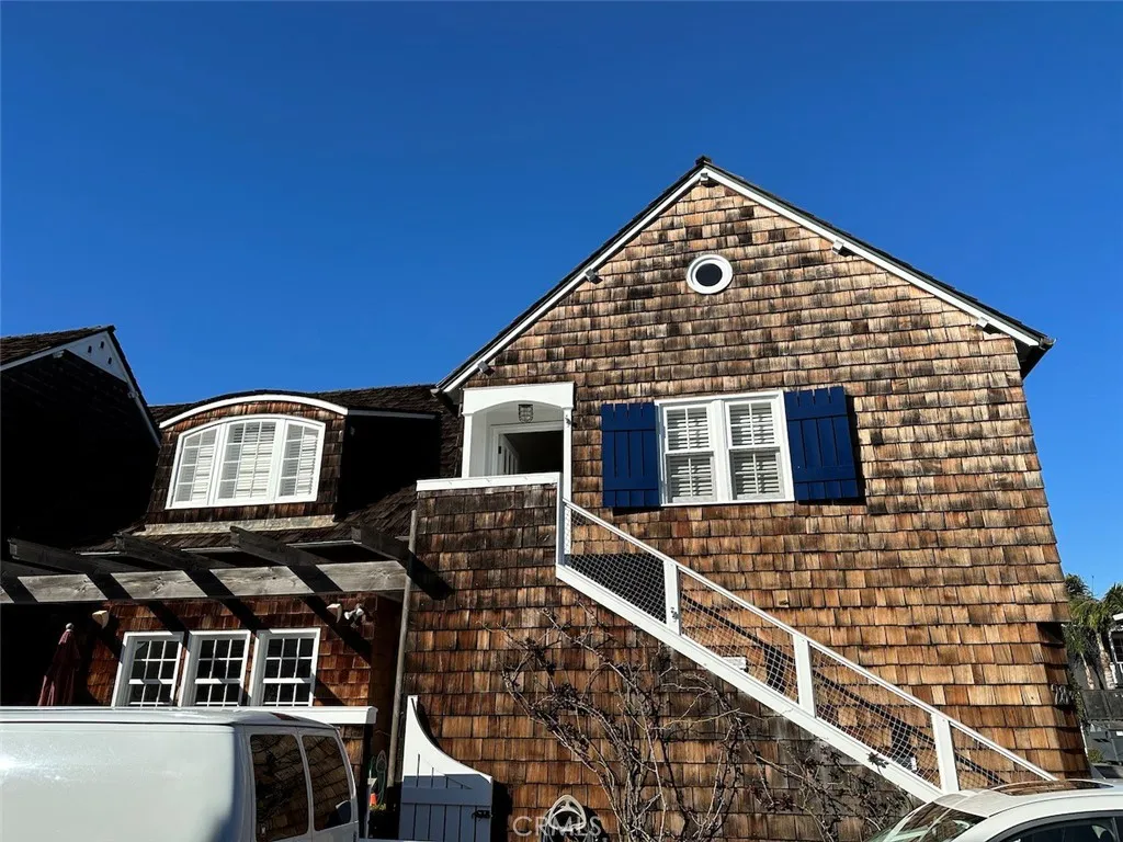 28 Beacon Bay Newport Beach, CA 92660 - Photo 2 of 15 a front view of a house