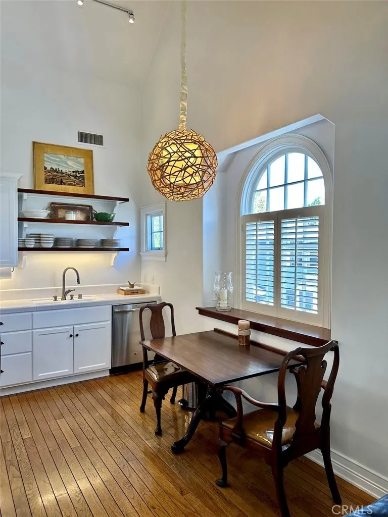 28 Beacon Bay Newport Beach, CA 92660 - Photo 7 of 15 a view of a dining room with furniture and window
