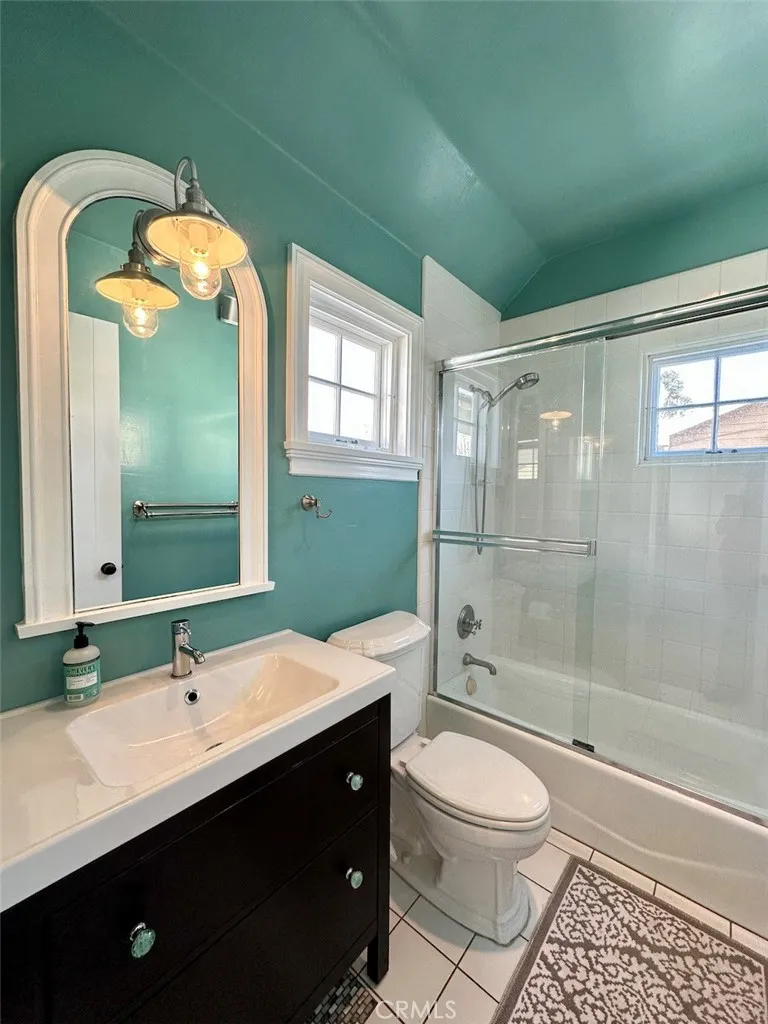 28 Beacon Bay Newport Beach, CA 92660 - Photo 9 of 15 a bathroom with a sink a toilet and shower
