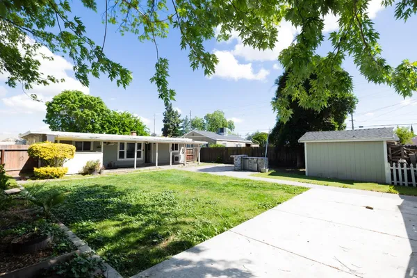 a house with yard in front of it