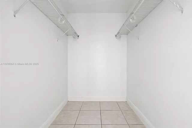 a view of an empty walk in closet