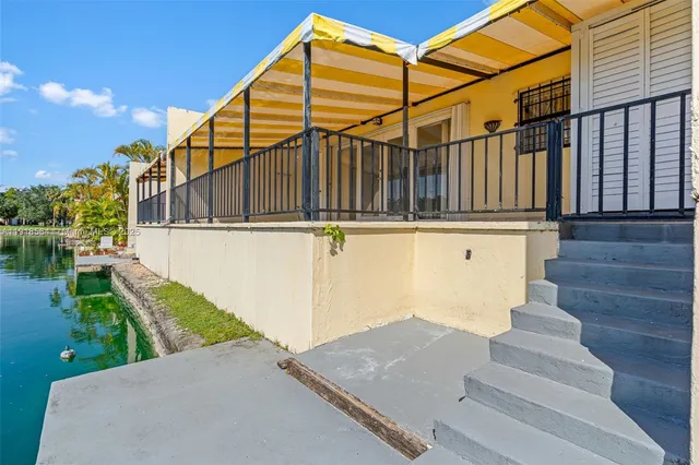 a view of a lake with a outdoor space