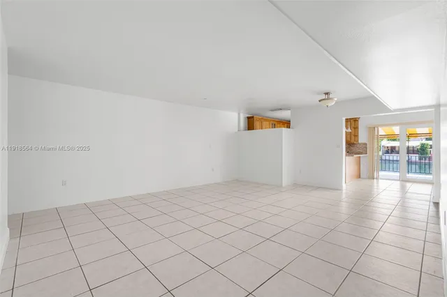 a view of an empty room and window