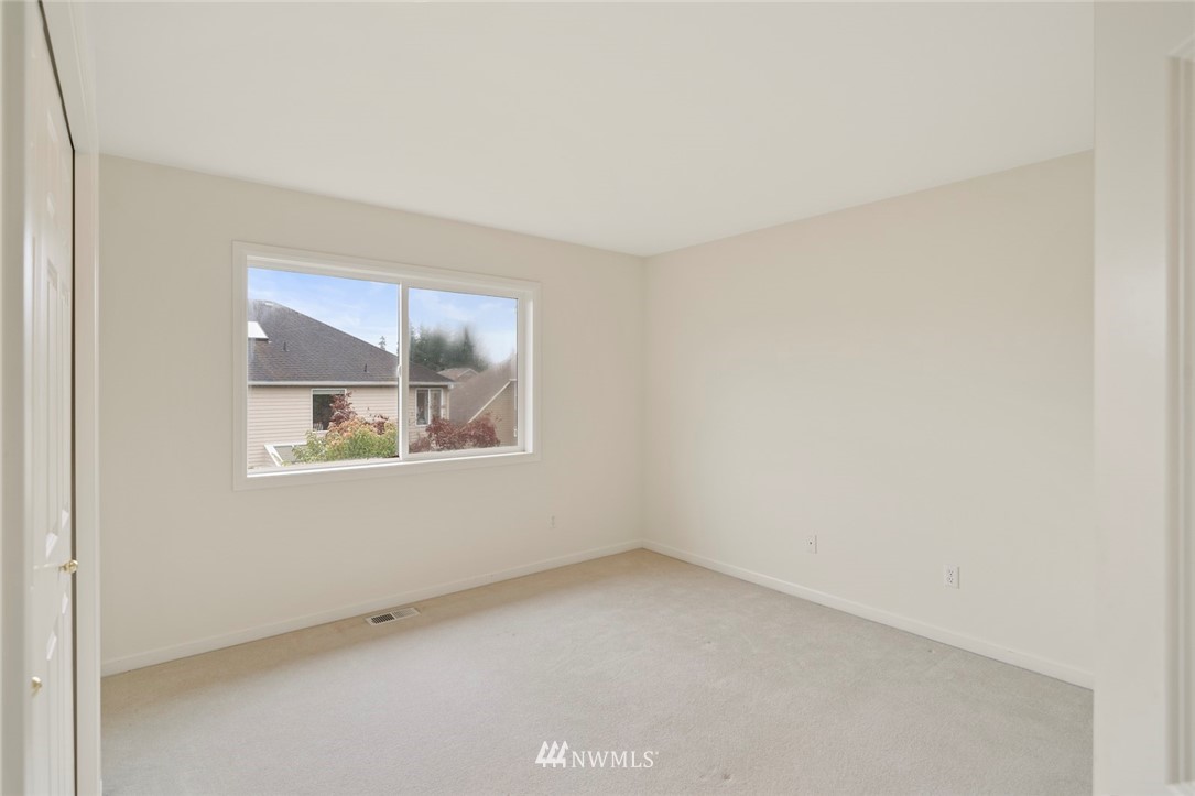 3914 207th Place Southeast Bothell, WA 98021 - Photo 14 of 21 an empty room with a window