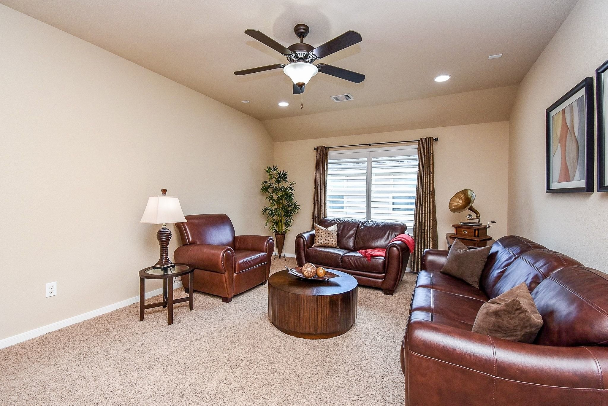 27607 Macklind Ridge Lane Katy, TX 77494 - Photo 35 of 50 Large game room up with ceiling fan and plantation shutters.