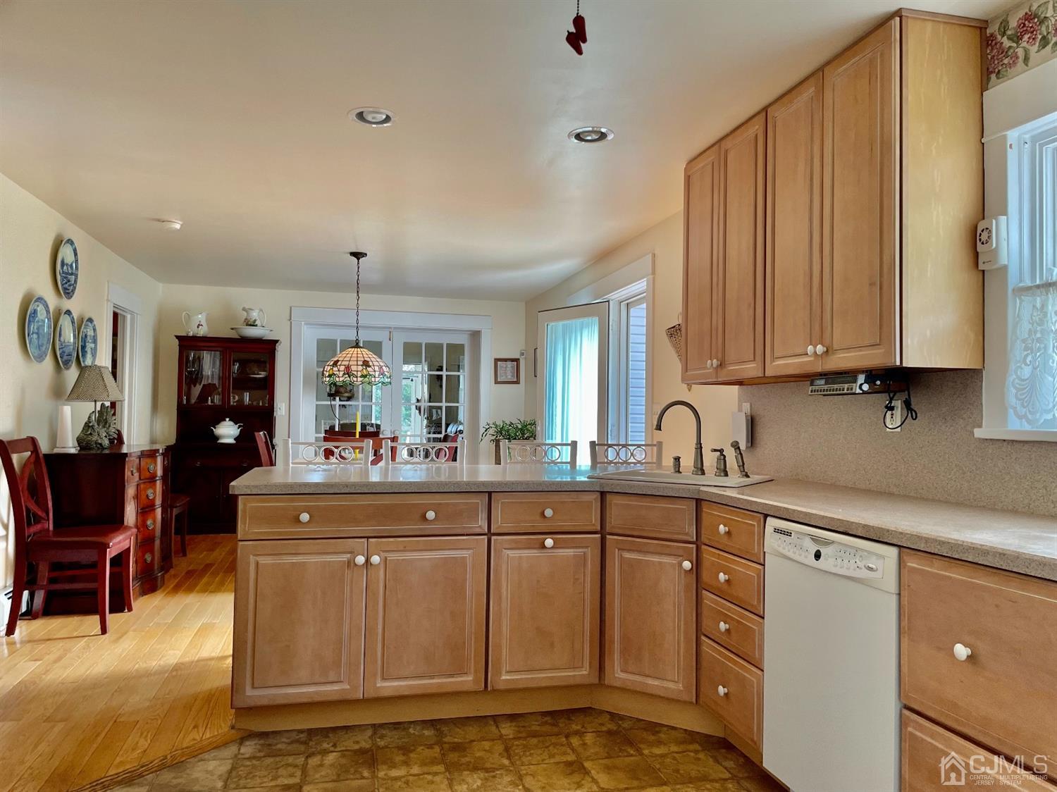 234 Morganville Road Old Bridge, NJ 07747 - Photo 13 of 52 a kitchen with stainless steel appliances granite countertop a sink and cabinets