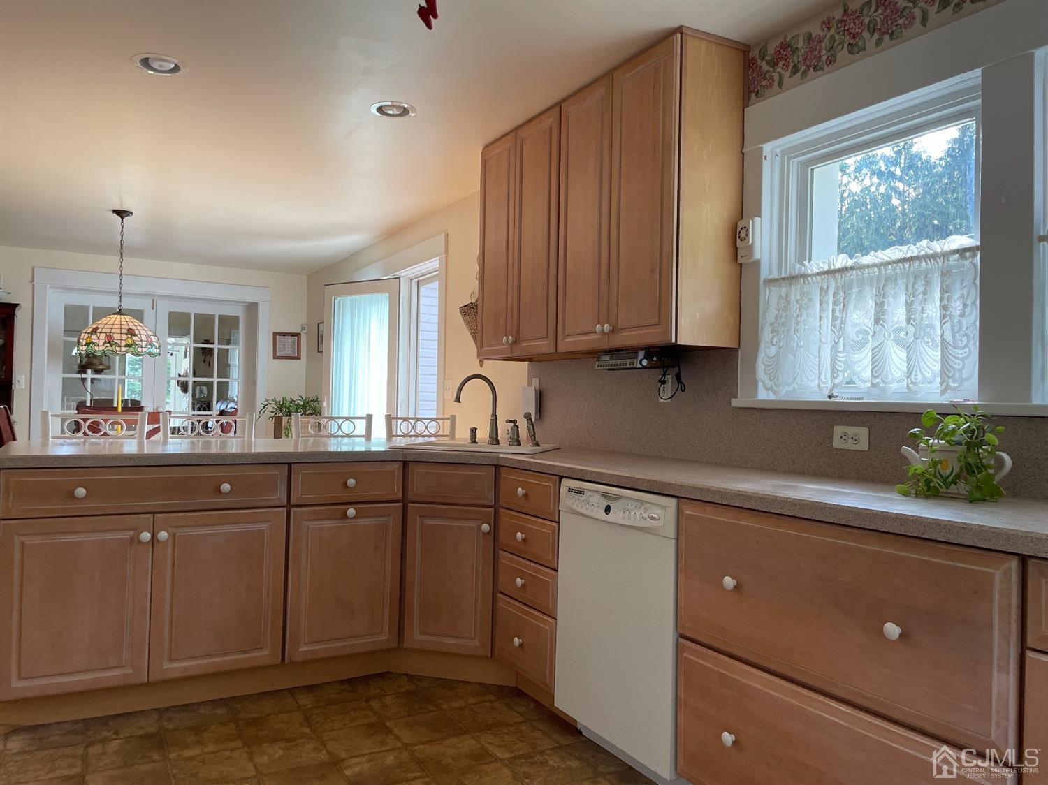 234 Morganville Road Old Bridge, NJ 07747 - Photo 14 of 52 a kitchen with a sink cabinets and window