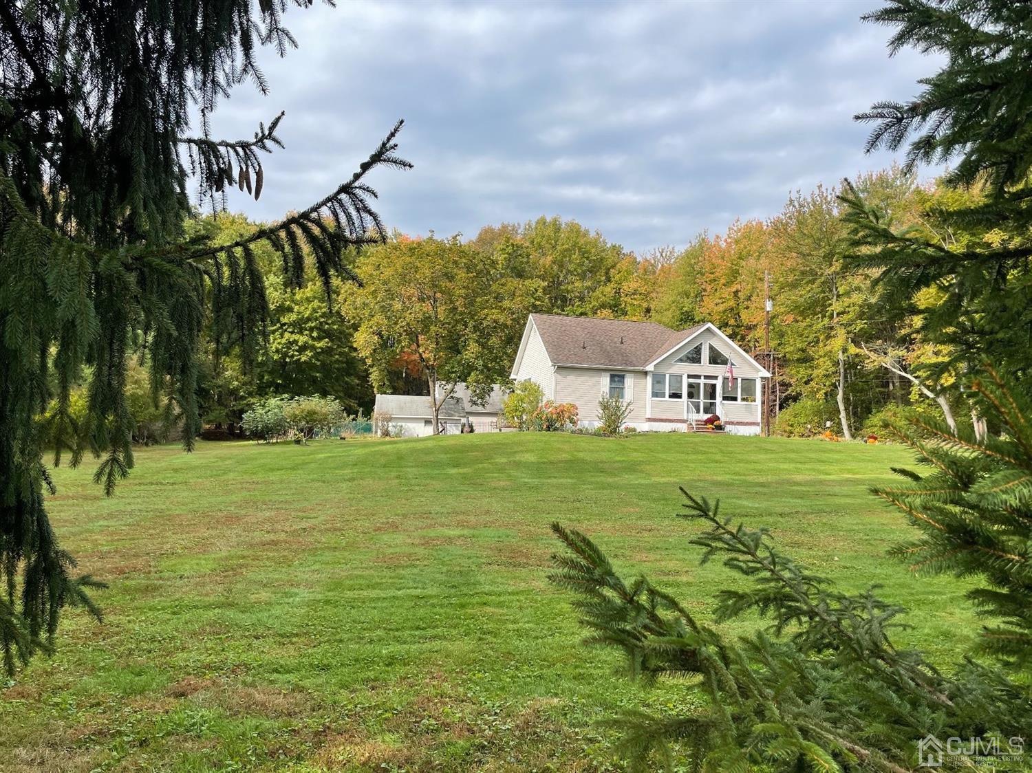 234 Morganville Road Old Bridge, NJ 07747 - Photo 3 of 52 a view of a house with a big yard