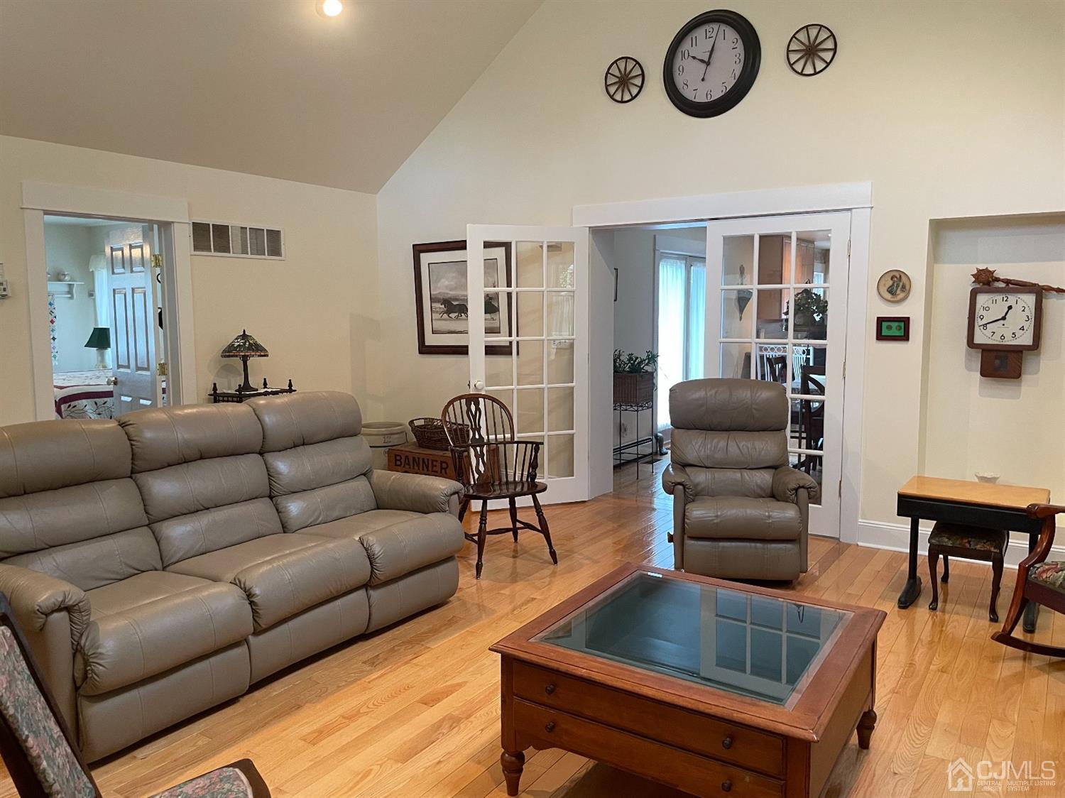234 Morganville Road Old Bridge, NJ 07747 - Photo 21 of 52 a living room with furniture and a large window